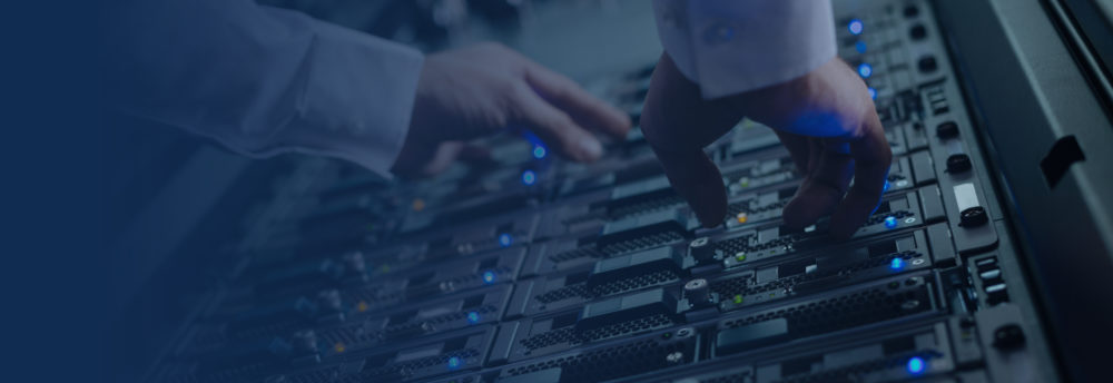 Dell VMAX maintenance hand working on server rack